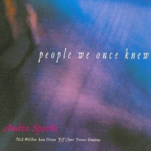 "CD cover with abstract blue and purple background, white and pink text."