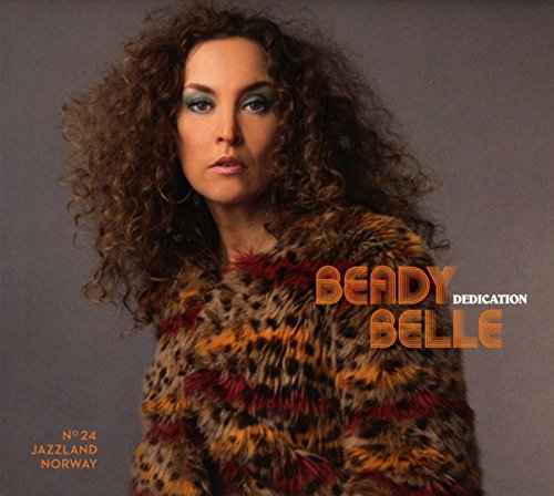 Album cover featuring a woman with curly hair, wearing a leopard print jacket.