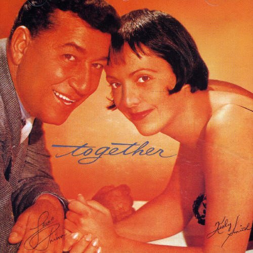"Album cover with Louis Prima and Keely Smith holding hands, smiling, against orange background."