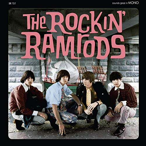 "Vinyl album cover featuring The Rockin' Ramrods band members crouching outside a stone building."