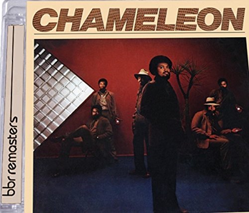 CD jewel case with album cover featuring five men in a red room.