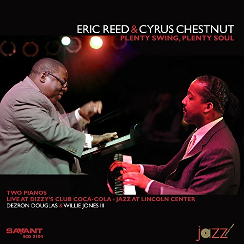 "Jazz album cover with two men playing pianos on a dark stage."