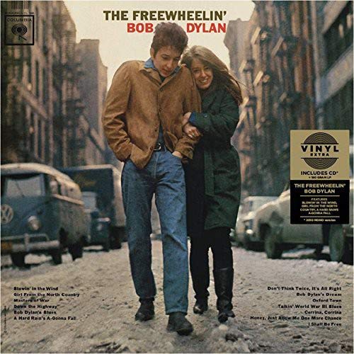 "Bob Dylan album cover featuring a man and woman walking down a city street."