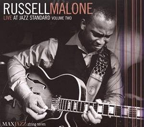Album cover featuring a man playing guitar, with text "Russell Malone Live At Jazz Standard".