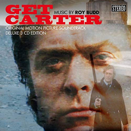 "Album cover for 'Get Carter' with close-up man's face and superimposed image."