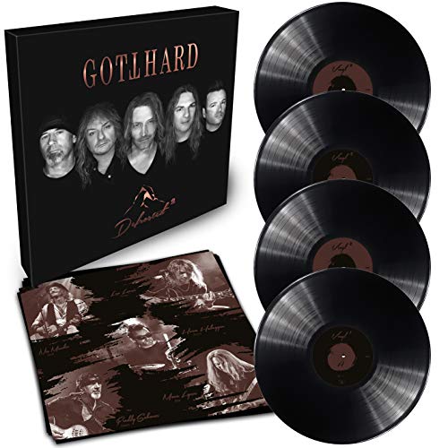 "Black album cover with five men and 'Gotthard' and 'Defrosted 2' in orange text."