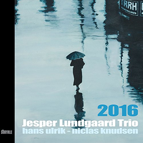 "Album cover featuring a person with an umbrella standing in a reflective puddle."