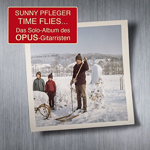 "CD cover with a Polaroid-style photo of three men in a snowy landscape."