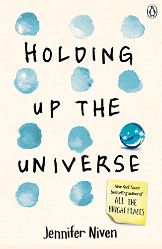 The image depicts a book cover with a beige background and blue watercolor spots.
