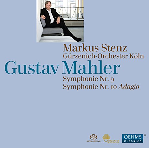 CD cover featuring a man in a suit on a light blue background.