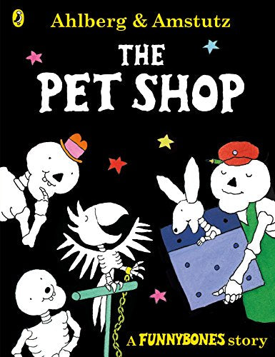 "Children's book cover featuring cartoon skeletons and a rabbit, with a black background."