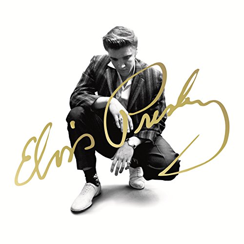 Elvis Presley CD box set with multiple CDs, booklets, and album covers on a white background.