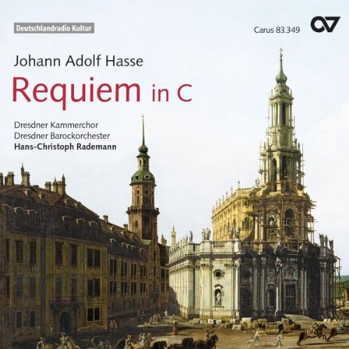 A CD cover featuring an old church with a tall tower and people outside.