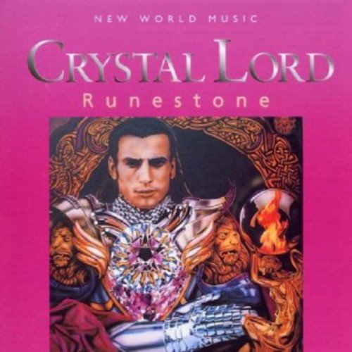 "Album cover with man in ornate armor holding a crystal orb, on a pink background."