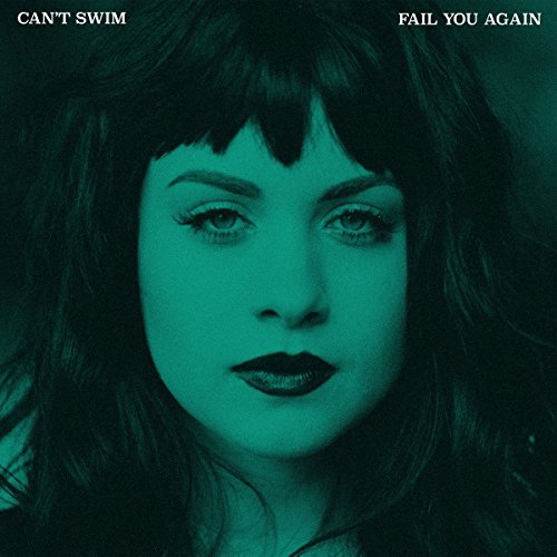 "Album cover featuring a close-up of a woman's face with green tint."