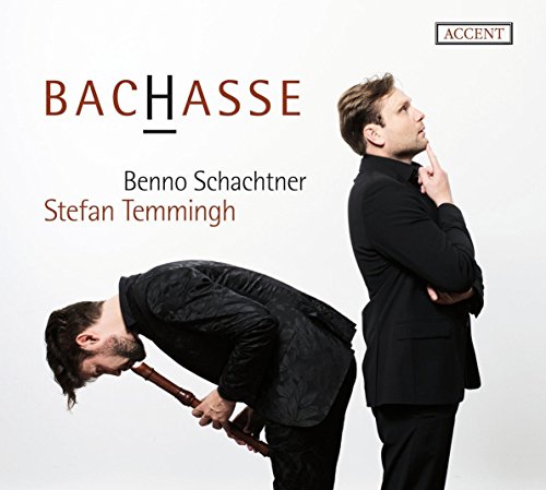 CD cover featuring two men in black, one bending, against a white background.