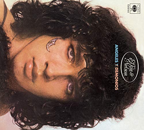 Album cover of a man with curly hair and a crescent moon on his forehead.