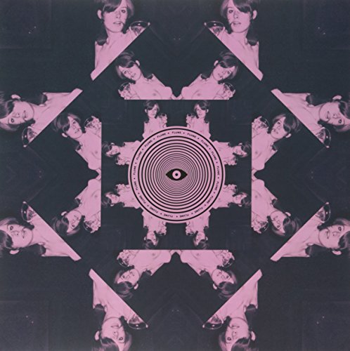 A vinyl record cover featuring a kaleidoscope pattern with a man's portrait.
