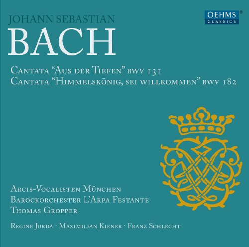 Blue CD cover with white text and a gold ornate emblem.