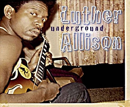 "Luther Allison album cover featuring a man holding a guitar, sepia-toned image."