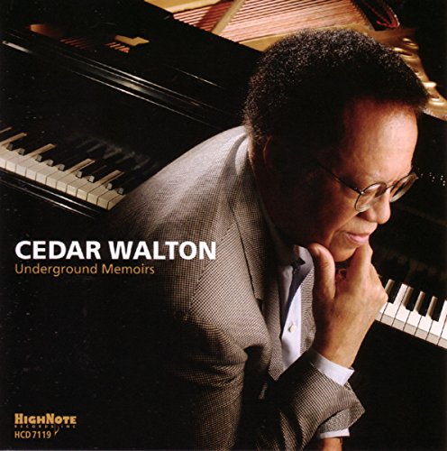 "Album cover featuring Cedar Walton leaning on a piano with contemplative expression."