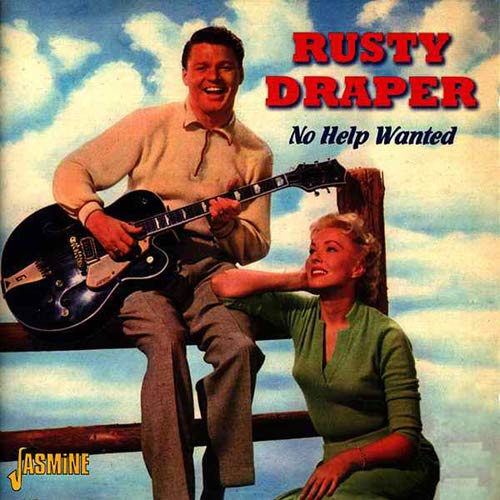"CD cover featuring a man with a guitar and a woman sitting together outdoors."