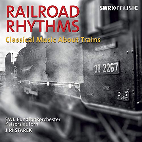 "Album cover featuring a black-and-white train image with red and yellow text overlay."