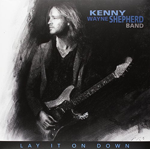 Vinyl album cover featuring Kenny Wayne Shepherd holding a guitar, in black and white.