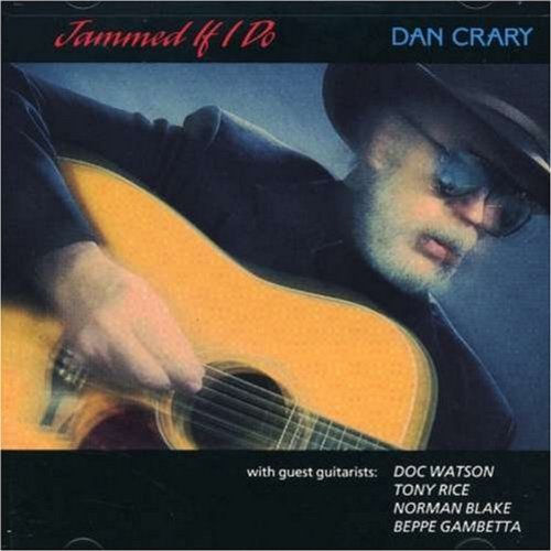 Man in hat plays guitar on Dan Crary's album cover "Jammed if I Do".