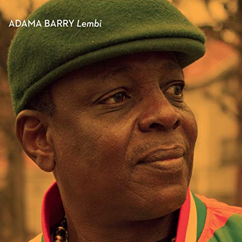 "Album cover featuring a man wearing a green hat and colorful shirt."