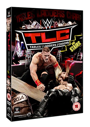 DVD case with WWE wrestlers in action, one slamming another onto a table.