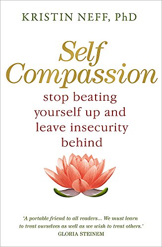 "Book cover with blue and pink swirling background, pink lotus flower, and white text."
