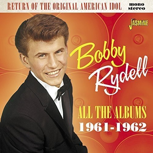 "CD cover featuring Bobby Rydell in a tuxedo against an orange background."
