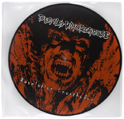 Vinyl record with red and black design, featuring a snarling face and white text.