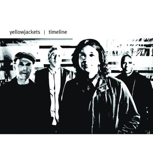 "Album cover with four band members in black and white, dark attire, against a white background."