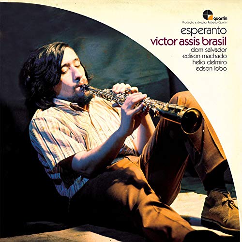 Vinyl album cover featuring a man playing a clarinet, reclining on the floor.