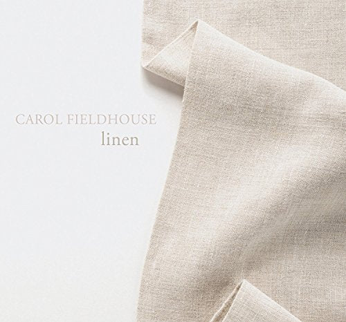 "CD cover featuring folded beige linen fabric on white background with artist's name."