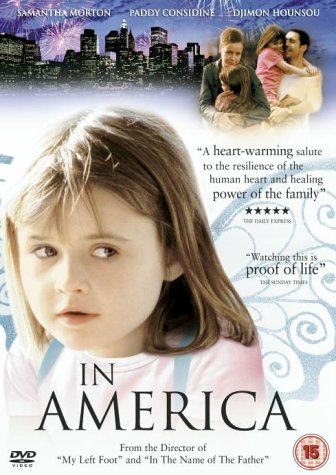 DVD cover for "In America" featuring a young girl and family scenes.