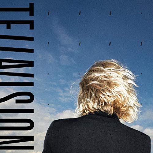 The alt text for the image is: "Album cover with a man with blond hair facing away."