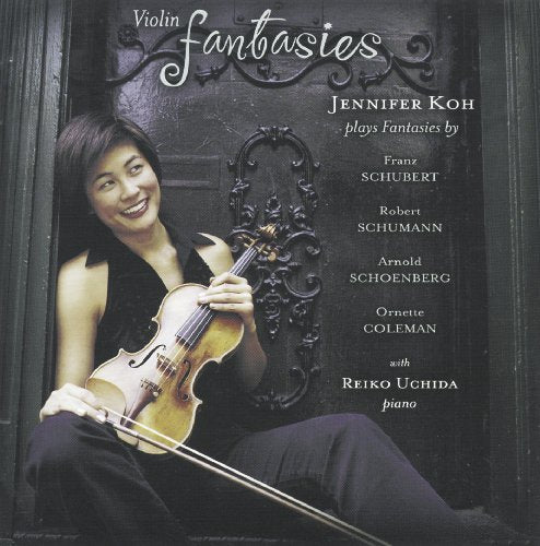 "CD cover featuring a woman holding a violin, sitting by an ornate door."