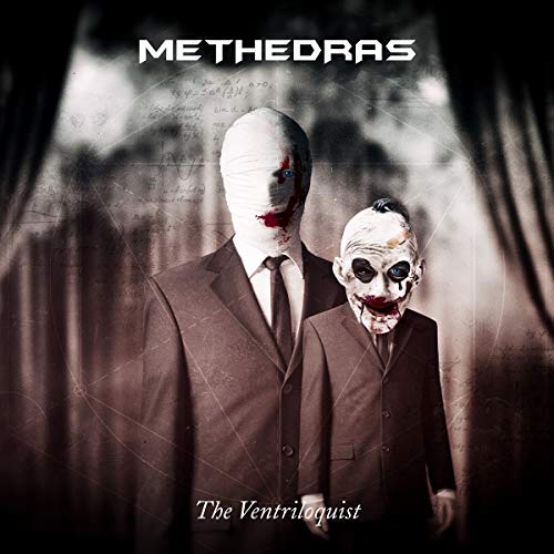 "Album cover featuring a man and a ventriloquist's dummy, both with distorted, bloody faces."