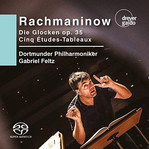 CD cover with conductor Gabriel Feltz holding baton, against a dark background with lights.