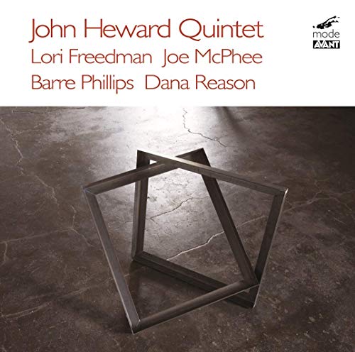 "Album cover featuring a metal geometric shape on a cracked dark floor."