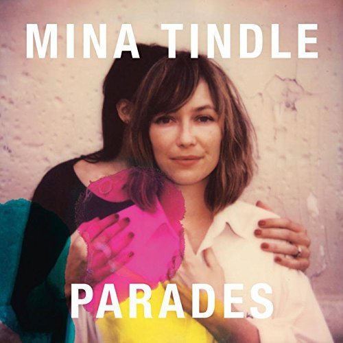 Album cover: two women embracing, with text "MINA TINDLE PARADES" overlaid on the image.