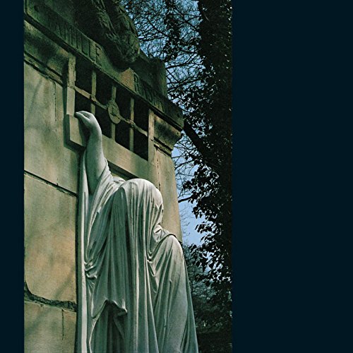 "Album cover featuring a statue of a robed figure against a stone wall."