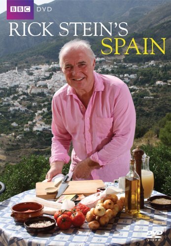 DVD cover featuring Rick Stein in pink shirt, preparing food on a table outdoors.