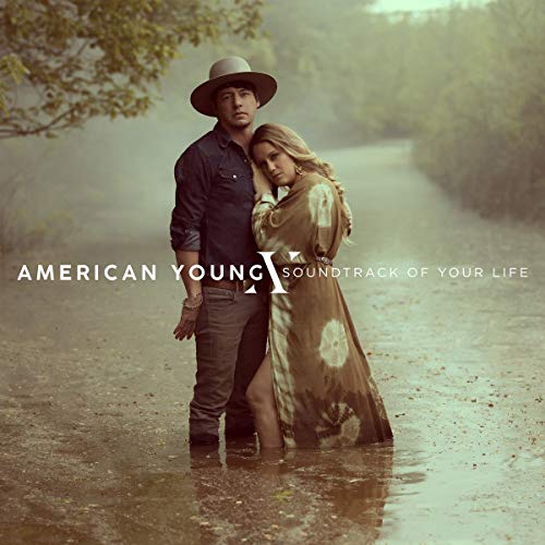"CD cover art: man and woman standing together in a flooded road."