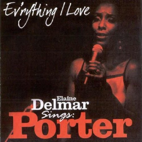 "Album cover featuring a woman holding a microphone, with artist and title text."