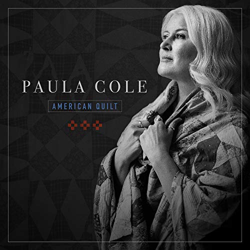 Paula Cole album cover, black and white portrait with quilt.