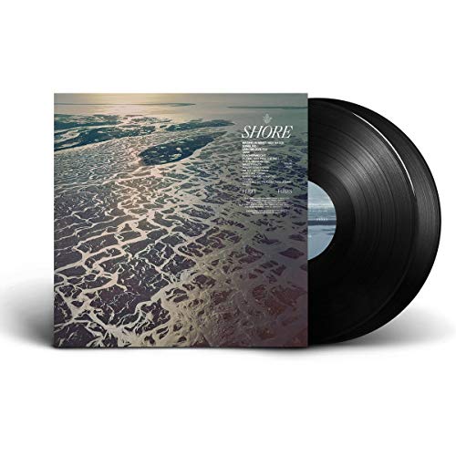 Vinyl record with cover featuring a beach scene and the word "SHORE" in white.